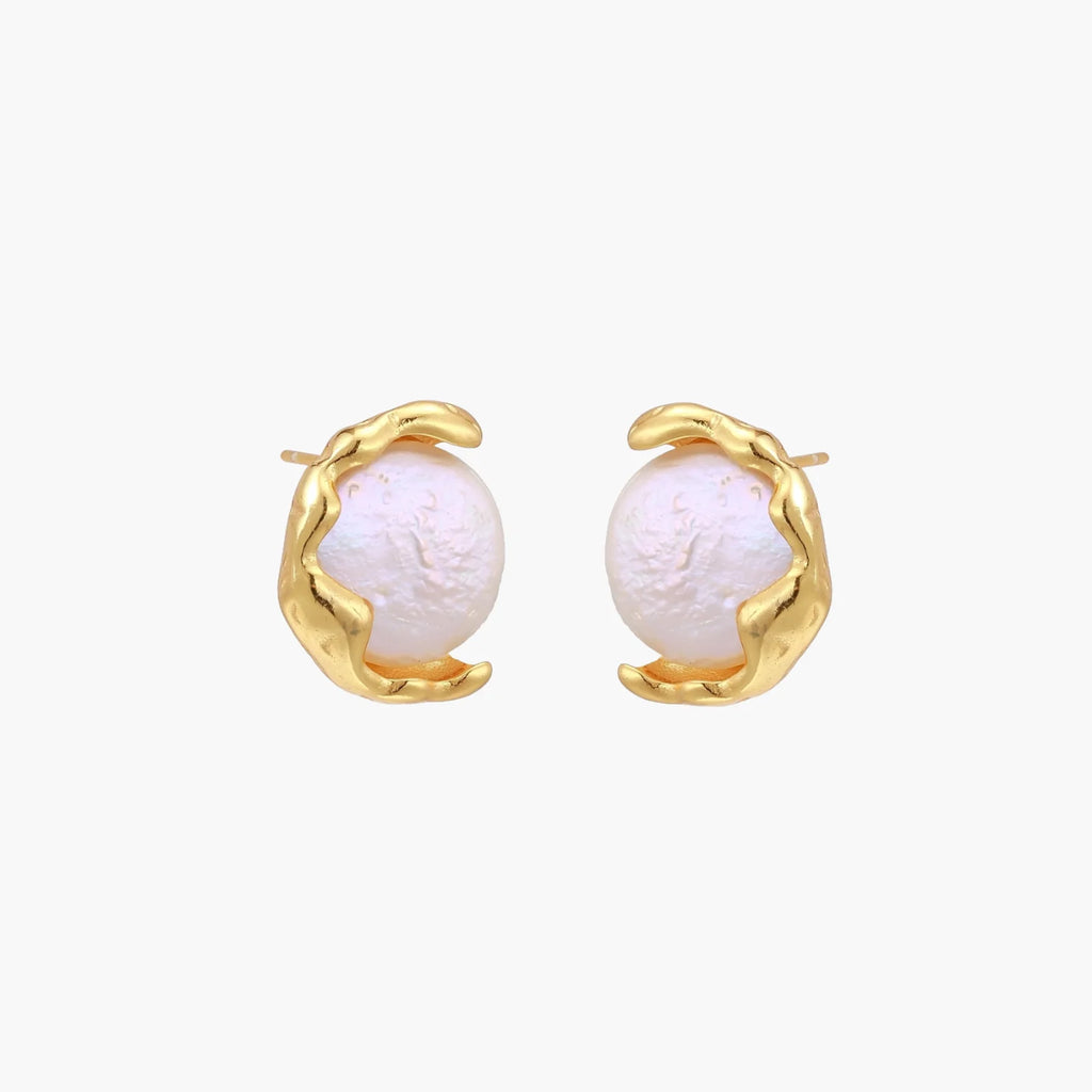 Gold vermeil studs with lustrous pink freshwater pearls in organic crescent settings