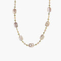 Iridescent baroque pearls alternating with small freshwater pearls on 14K gold-plated chain