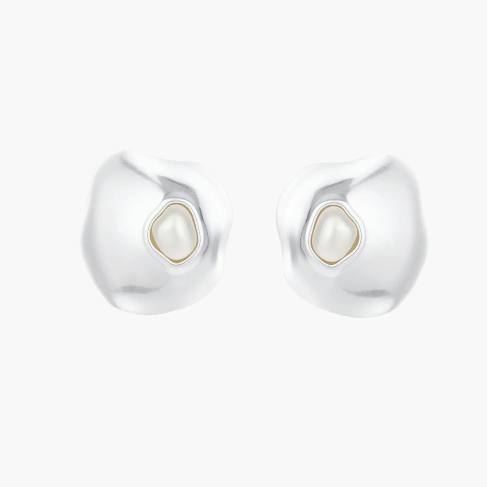 Organic-shaped eco-zinc alloy stud earrings with resin pearl centers and sterling silver posts on white background.