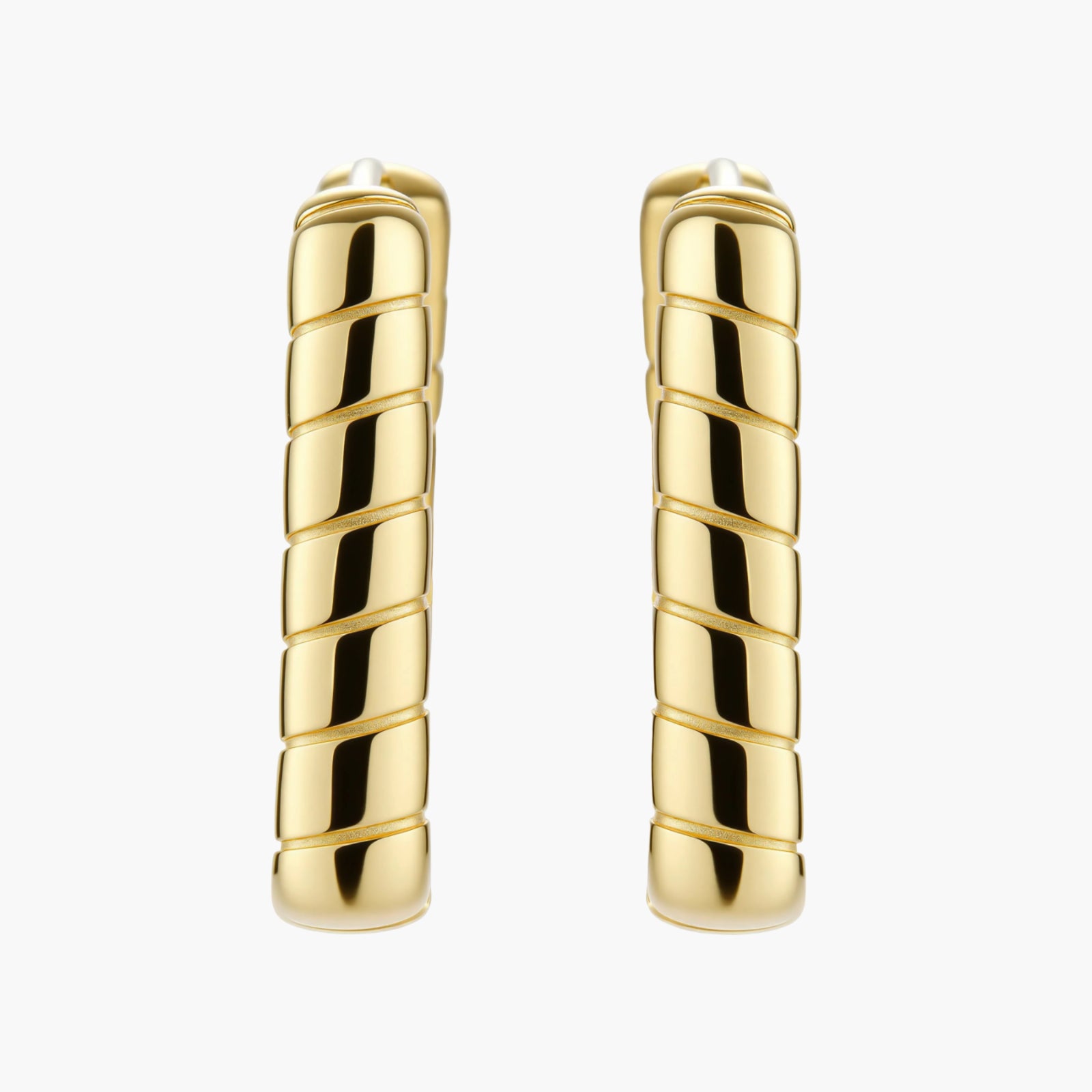 Chunky segmented gold-plated huggie hoop earrings with bamboo-inspired geometric design on white background.