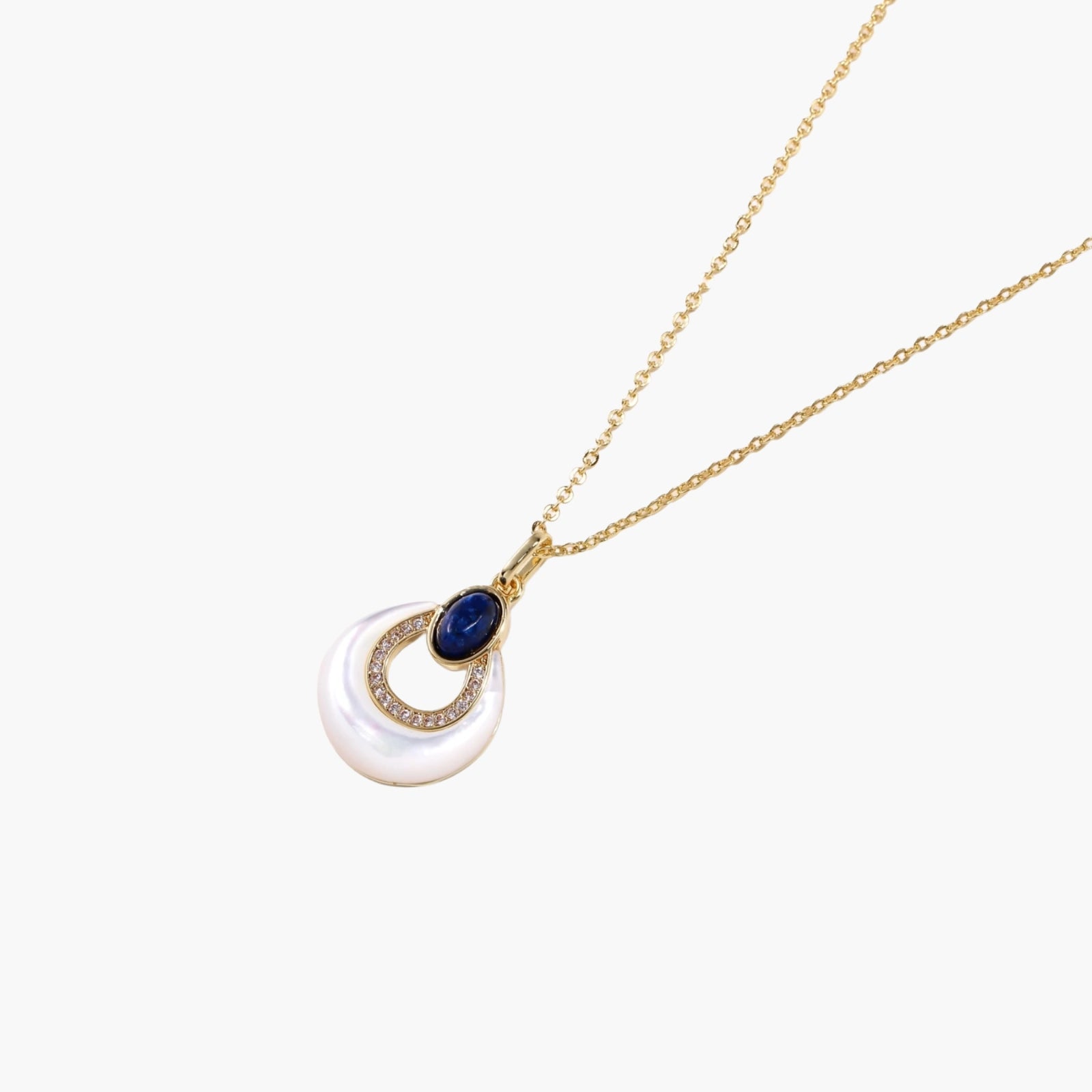 Gold necklace with navy lapis lazuli stone and iridescent mother-of-pearl teardrop pendant with crystal accents