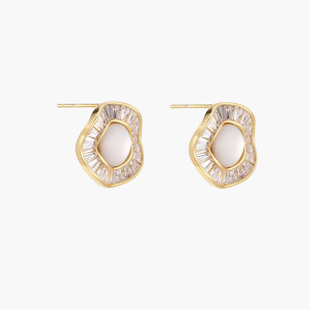 14K gold-plated stud earrings with freshwater pearl center surrounded by baguette-cut crystal halo in sunburst design