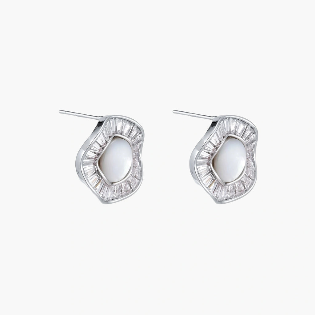 14K gold-plated stud earrings with freshwater pearl center surrounded by baguette-cut crystal halo in sunburst design