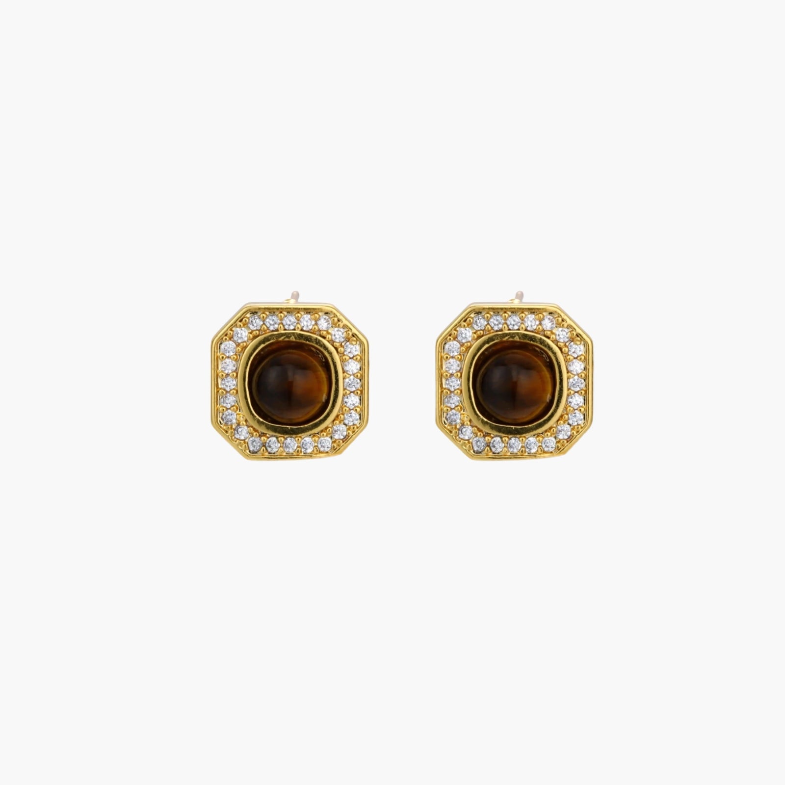 Gold-plated octagonal stud earrings with brown tiger's eye centers and cubic zirconia border on cream background.