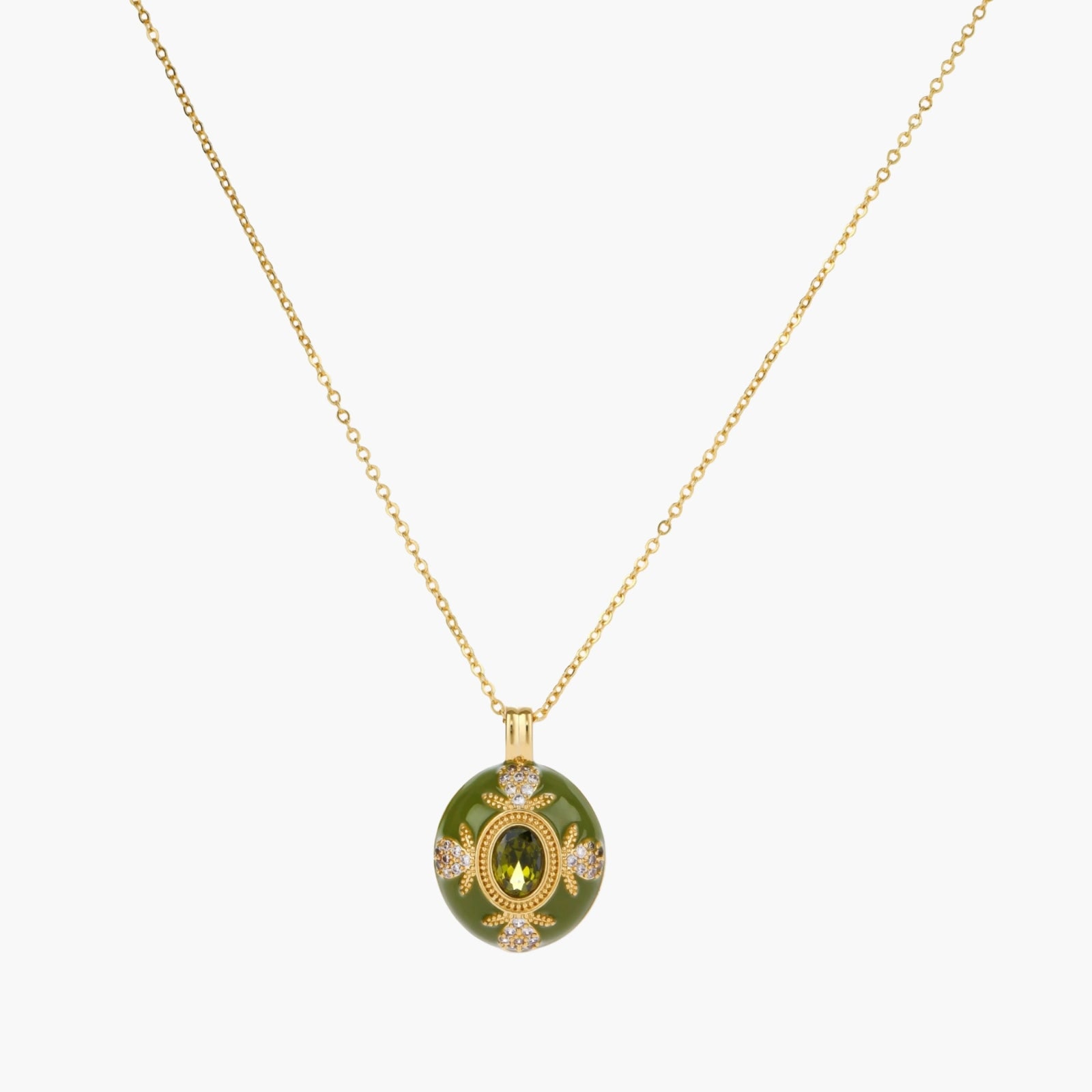 Gold-plated pendant necklace with green enamel background and oval olive cubic zirconia center stone with crystal accents.